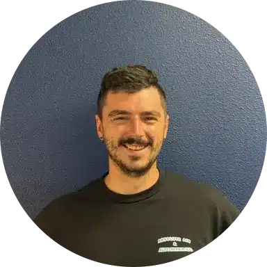 Headshot photo of Caughlin